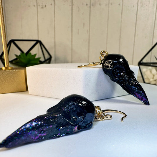 Black Duo Chrome Color Shifting Raven Skull Eardrops (gold)